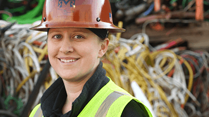 woman in hard hat and reflective vest